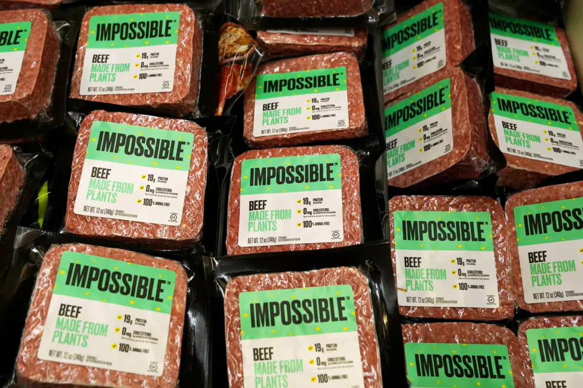 Impossible Foods plant-based beef products are seen inside a refrigerator at the meat section of a chain supermarket in Hong Kong, on Oct. 20, 2020. (Lam Yik/Reuters)