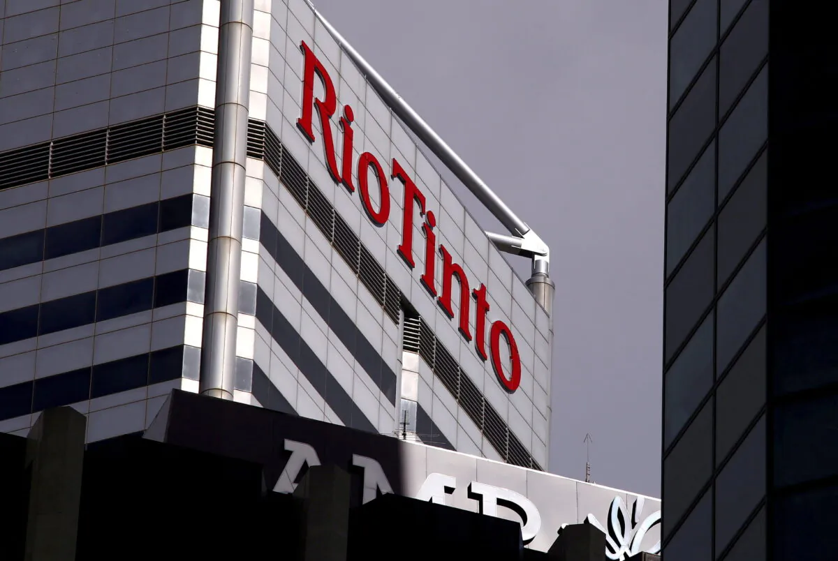 A sign adorns the building where mining company Rio Tinto has their office in Perth, Western Australia, on Nov. 19, 2015. (David Gray/Reuters)