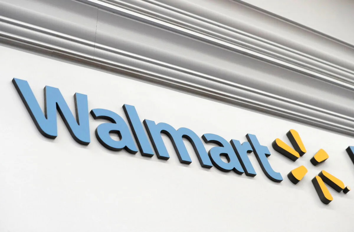 A Walmart sign inside its department store in West Haven, Conn., on Feb. 17, 2021. (Mike Segar/Reuters)