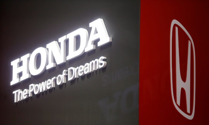 The Honda logo is displayed at the 89th Geneva International Motor Show on March 5, 2019. (Pierre Albouy/Reuters)