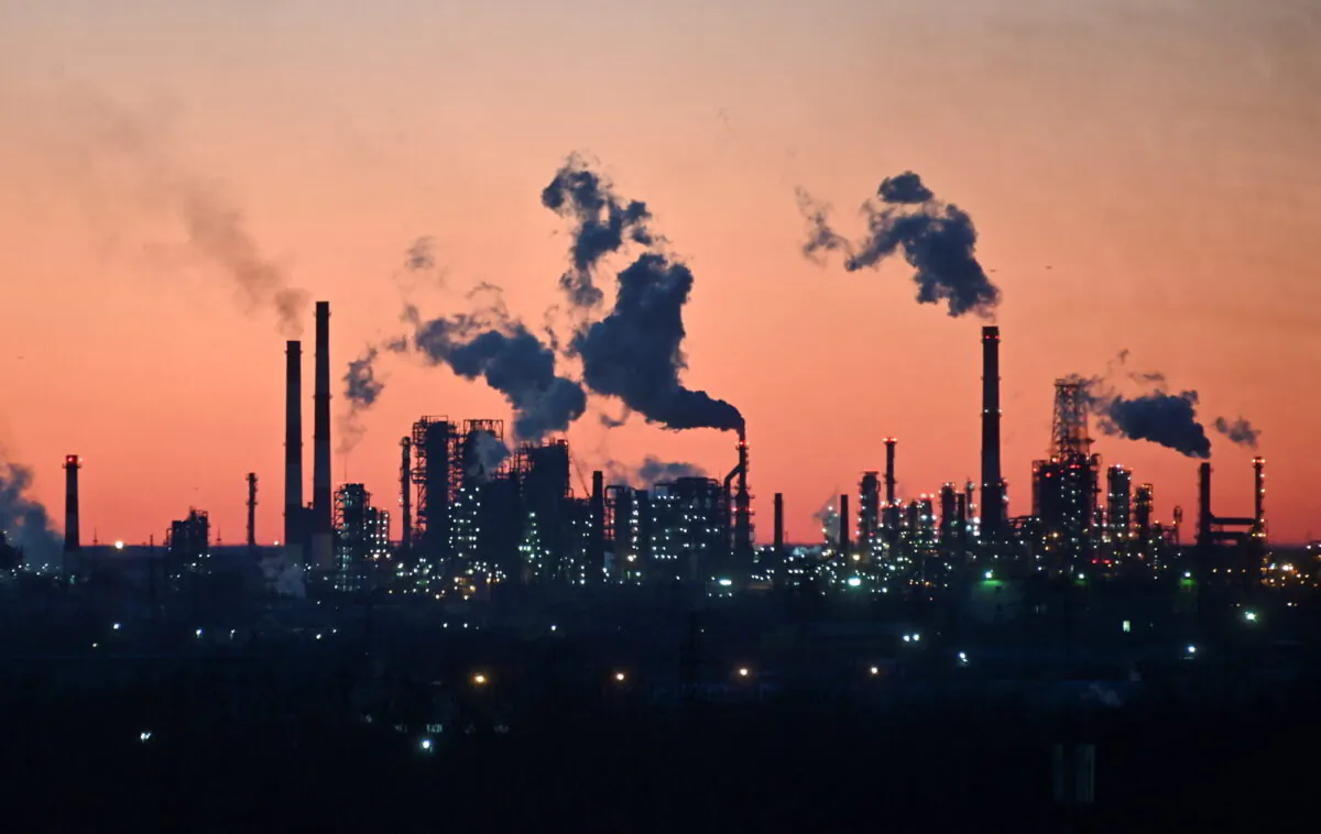 A local oil refinery during sunset in Omsk, Russia, on March 16, 2022. (Alexey Malgavko/Reuters)