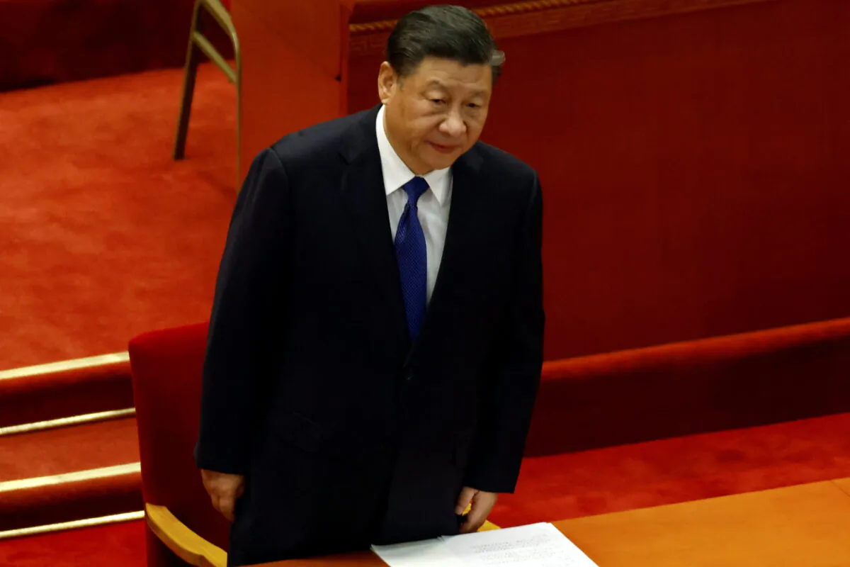 Chinese leader Xi Jinping arrives for the closing session of the Chinese People's Political Consultative Conference (CPPCC) at the Great Hall of the People in Beijing, China, on March 10, 2022. (Carlos Garcia Rawlins/Reuters)