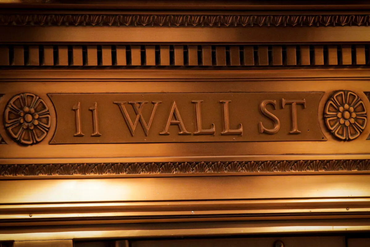A sign is seen outside the 11 Wall St. entrance of the New York Stock Exchange (NYSE) in New York, U.S., March 1, 2021. (Brendan McDermid/Reuters)