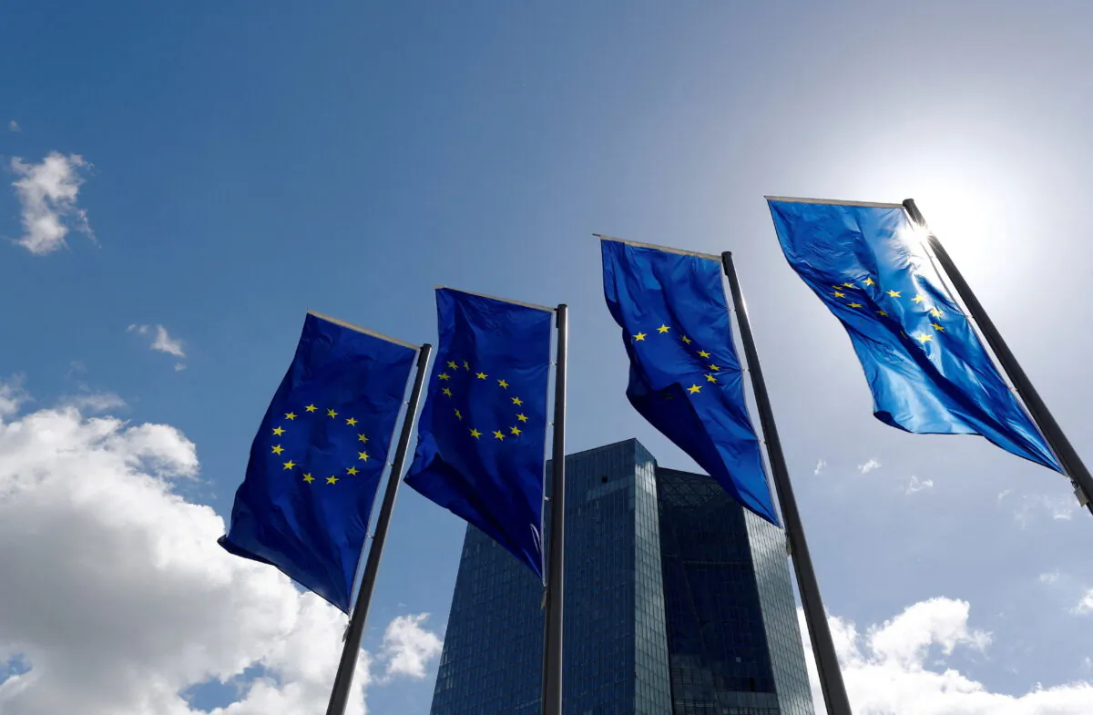 European Union flags flutter outside the European Central Bank headquarters in Frankfurt, Germany, on April 26, 2018. (Kai Pfaffenbach/Reuters)