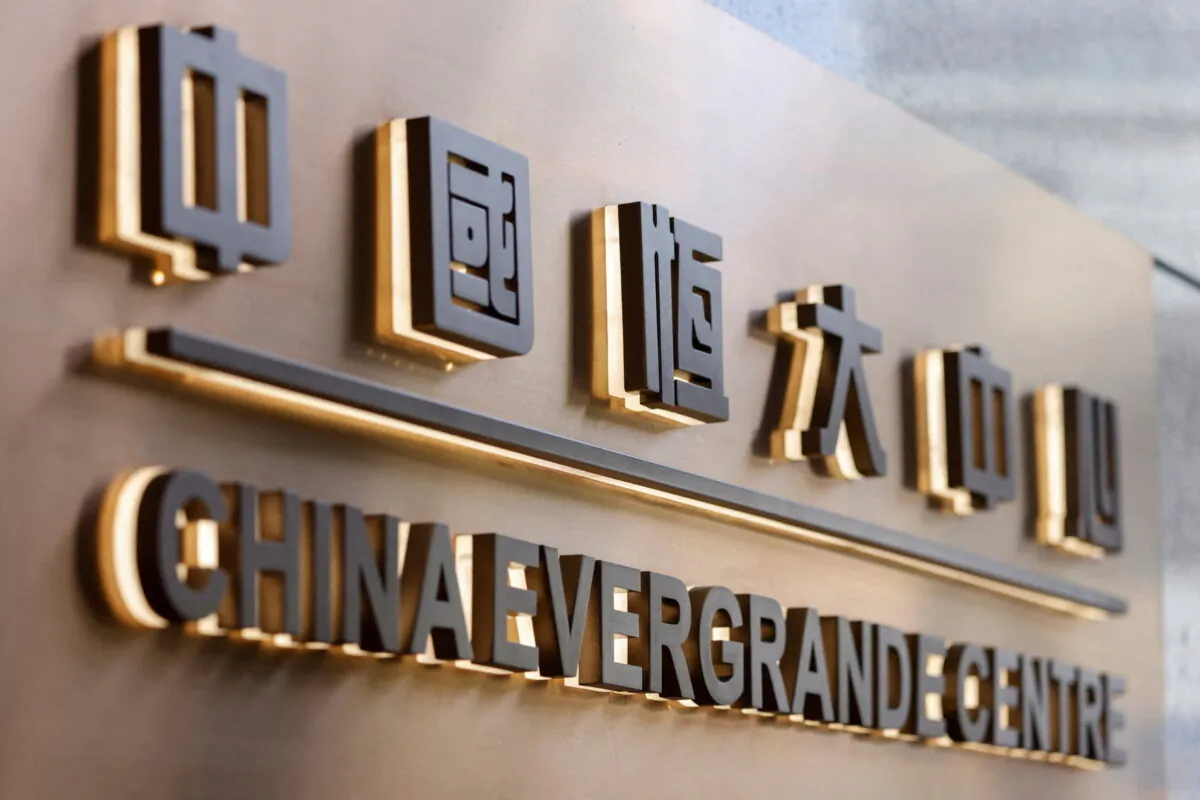 The China Evergrande Centre building sign is seen in Hong Kong, China, on Dec. 7, 2021. (Tyrone Siu/Reuters)