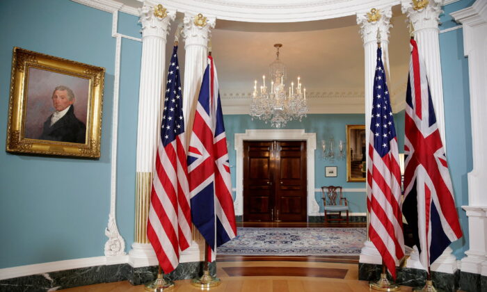 The flags of the United States and the United Kingdom stand after bi-lateral photo between U.S. Secretary of State Rex Tillerson and British Foreign Minister Boris Johnson was cancelled at the State Department in Washington, on March 22, 2017.      (Joshua Roberts/Reuters)