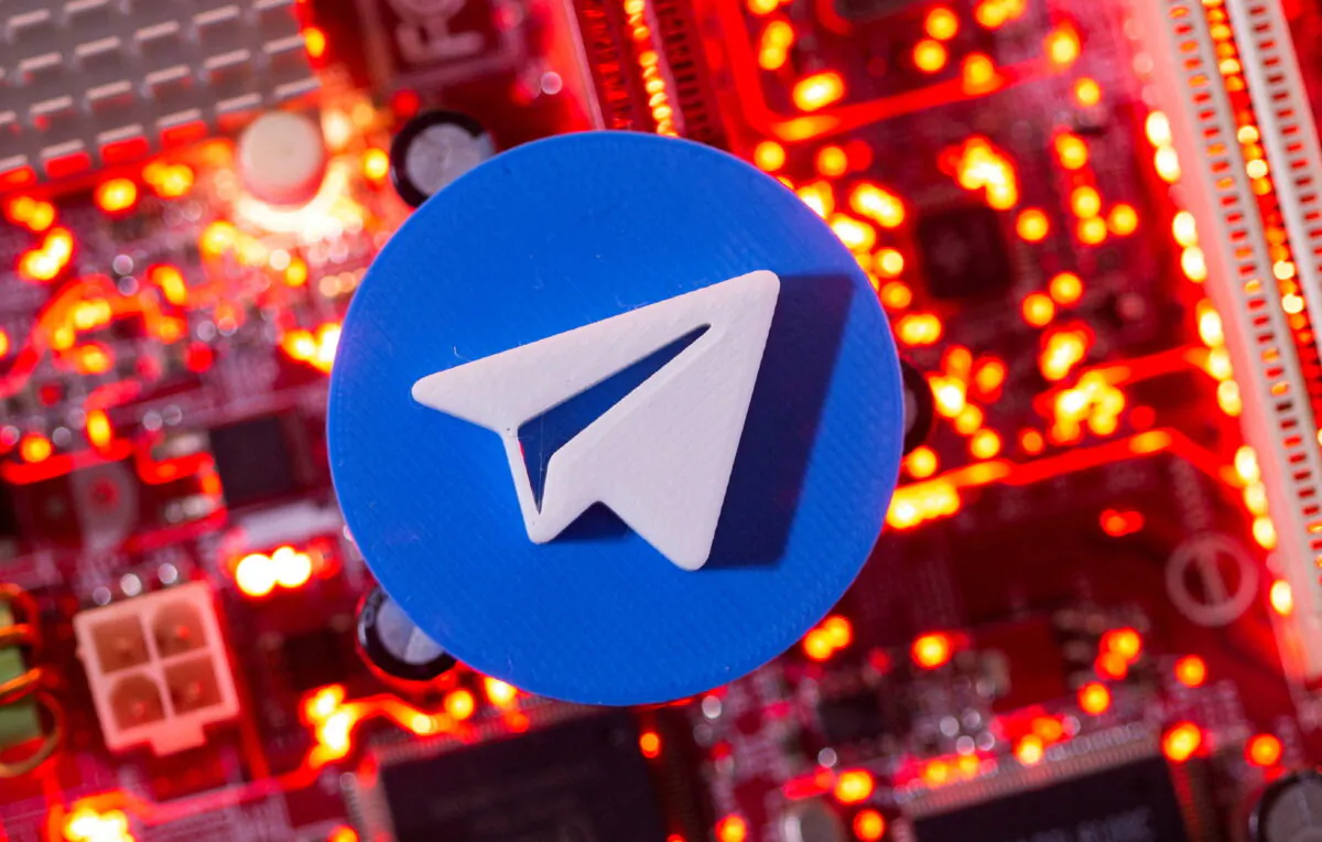 A 3D-printed Telegram logo is placed on a computer motherboard in this illustration taken on Jan. 21, 2021. (Dado Ruvic/Reuters)