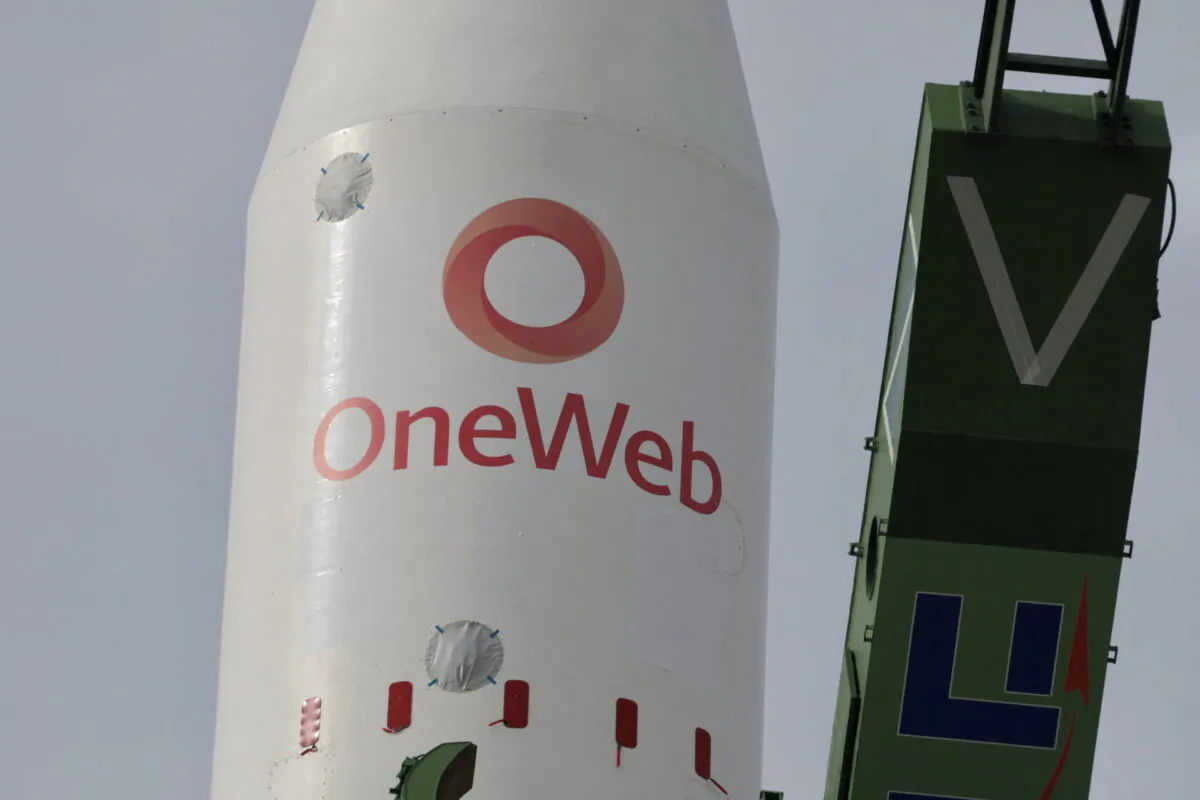A Soyuz-2.1b rocket booster with a Fregat upper stage and satellites of British firm OneWeb is removed from a launchpad at the Baikonur Cosmodrome in Kazakhstan on March 4, 2022. (Roscosmos/Handout via Reuters) 
