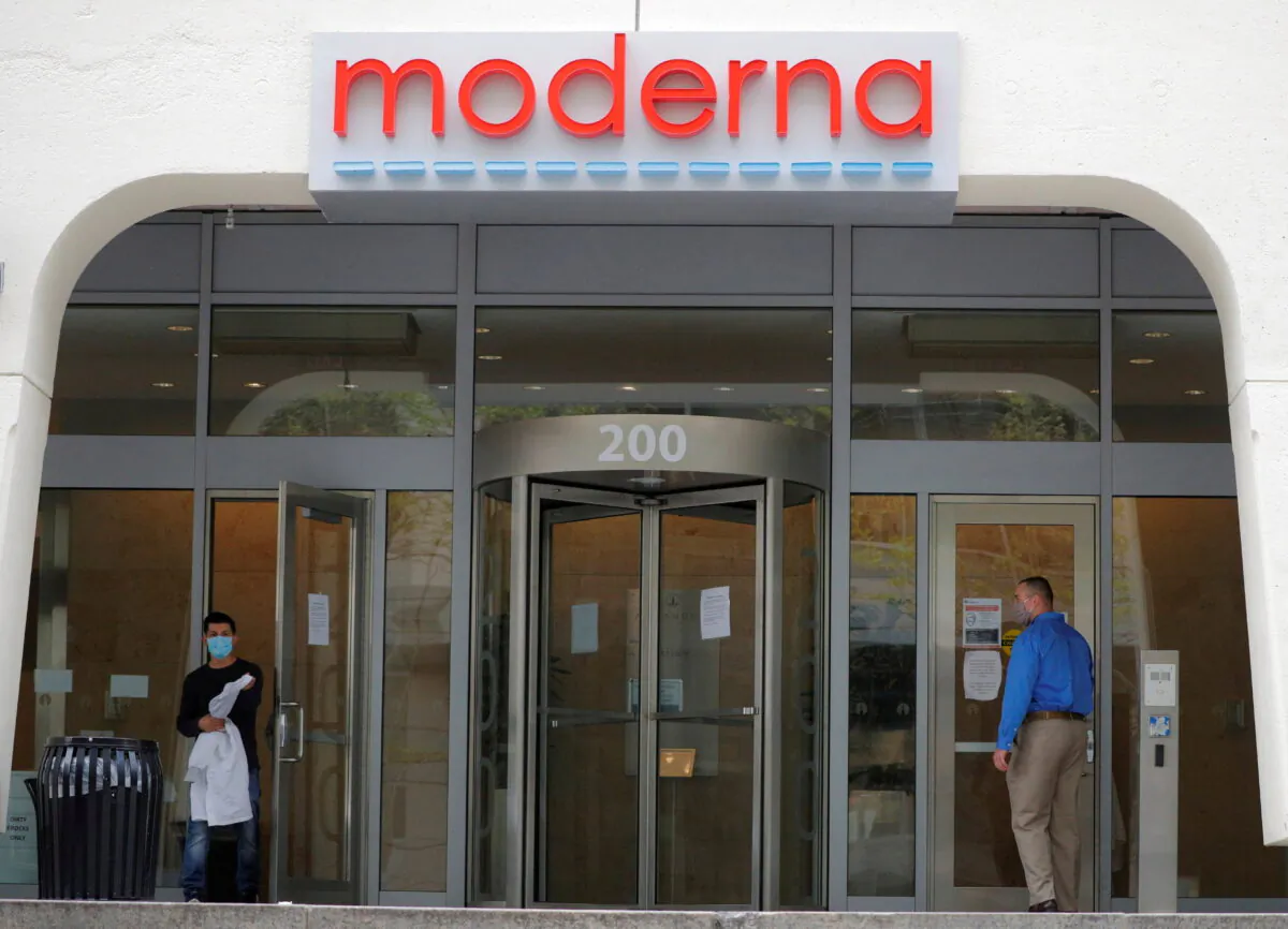 FILE PHOTO: A sign marks the headquarters of Moderna Therapeutics, which is developing a vaccine against the coronavirus disease (COVID-19), in Cambridge, Massachusetts, U.S., May 18, 2020. REUTERS/Brian Snyder