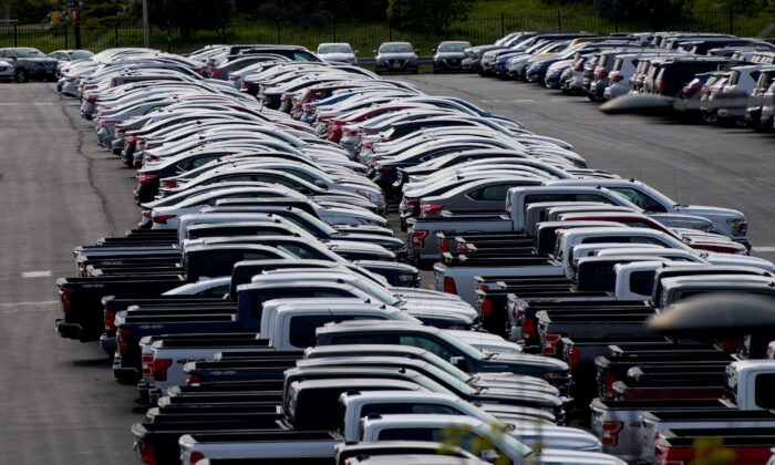Cars unsold due to the autos market slowdown caused by coronavirus disease (COVID-19) are seen stored in the parking lot of the Wells Fargo Center in Philadelphia, on April 28, 2020.  (Mark Makela/Reuters)