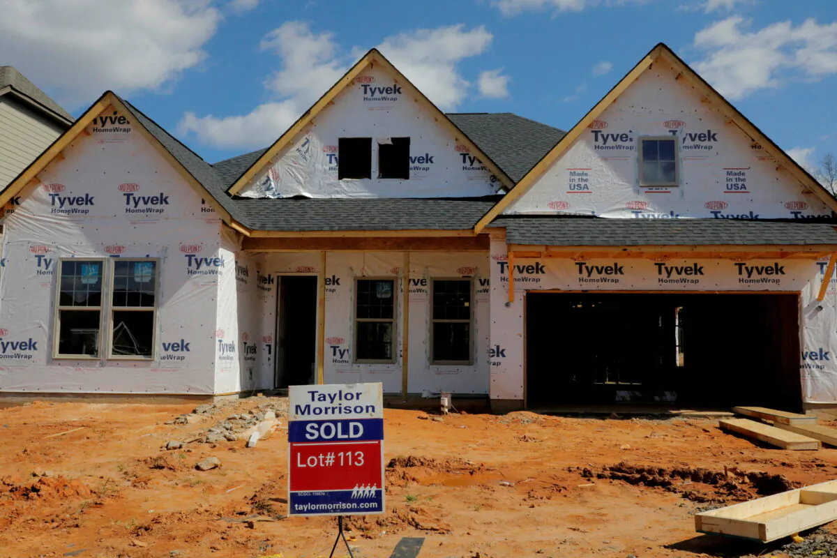 A home under construction stands behind a "sold" sign in a new development in York County, South Carolina, Feb. 29, 2020. (Lucas Jackson/Reuters)