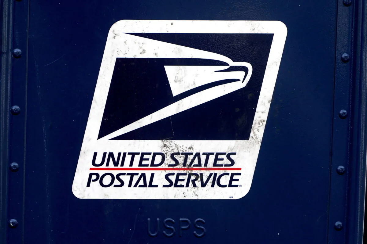 A U.S. Postal Service logo is pictured on a mail box in the Manhattan borough of New York on Aug. 21, 2020. (Carlo Allegri/Reuters)