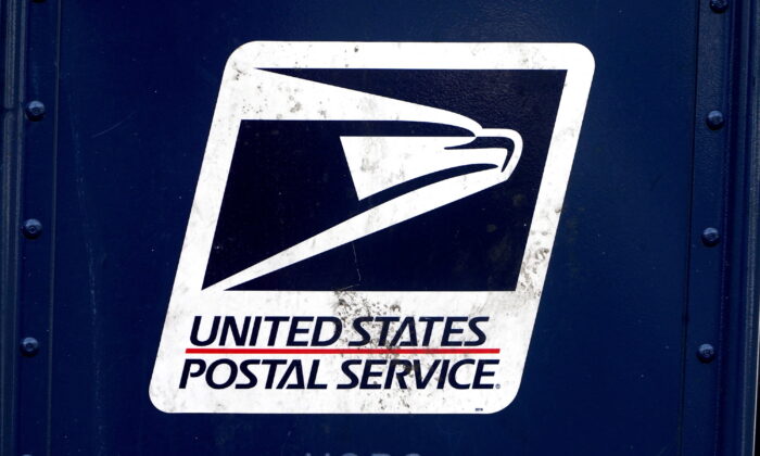 A U.S. Postal Service logo is pictured on a mail box in the Manhattan borough of New York on Aug. 21, 2020. (Carlo Allegri/Reuters)