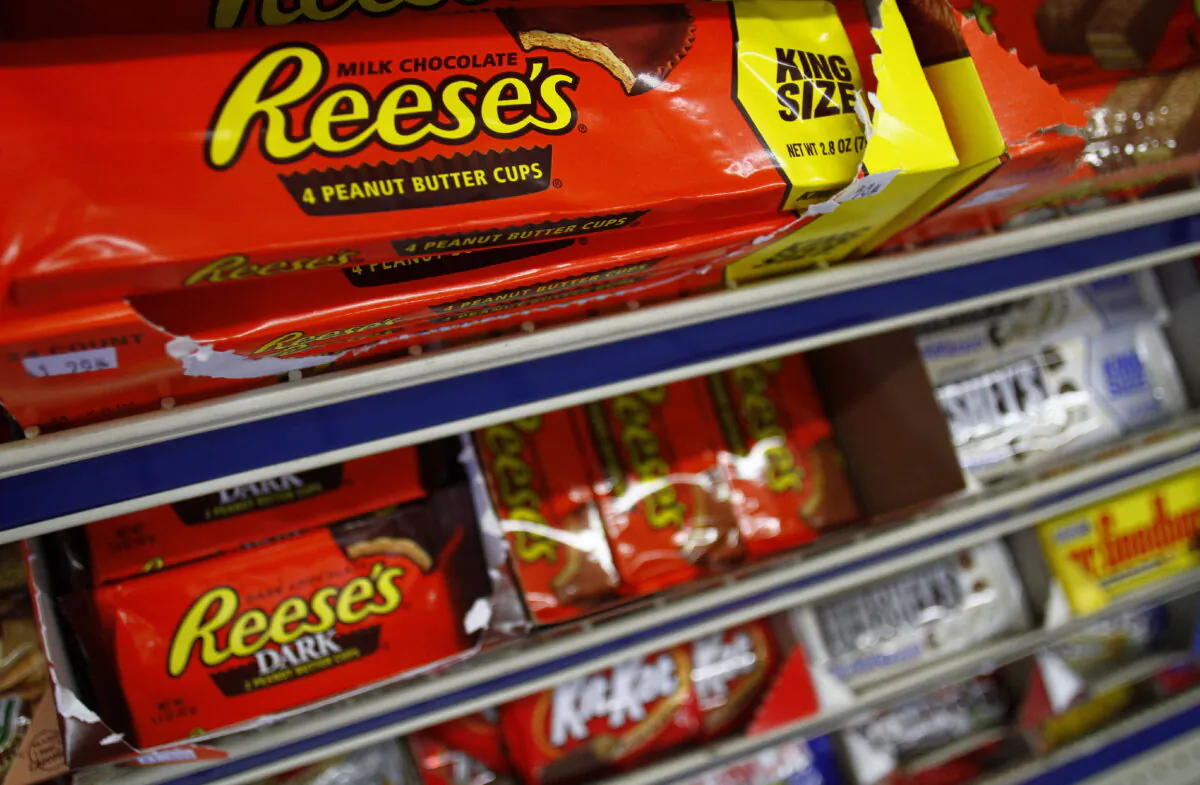 Packets of Reese’s peanut butter cups, a Hershey product, are displayed at a gas station in Phoenix on Oct. 27, 2011. (Joshua Lott/Reuters)