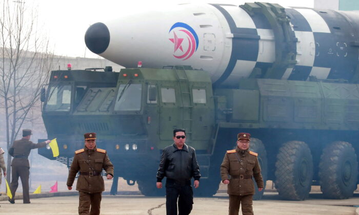 North Korean leader Kim Jong Un walks away from what state media report is a "new type" of intercontinental ballistic missile in this undated photo released on March 24, 2022 by North Korea's Korean Central News Agency (KCNA). (KCNA via Reuters)