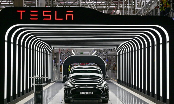 Model Y cars are pictured during the opening ceremony of the new Tesla Gigafactory for electric cars in Gruenheide, Germany, on March 22, 2022. (Patrick Pleul/Reuters)