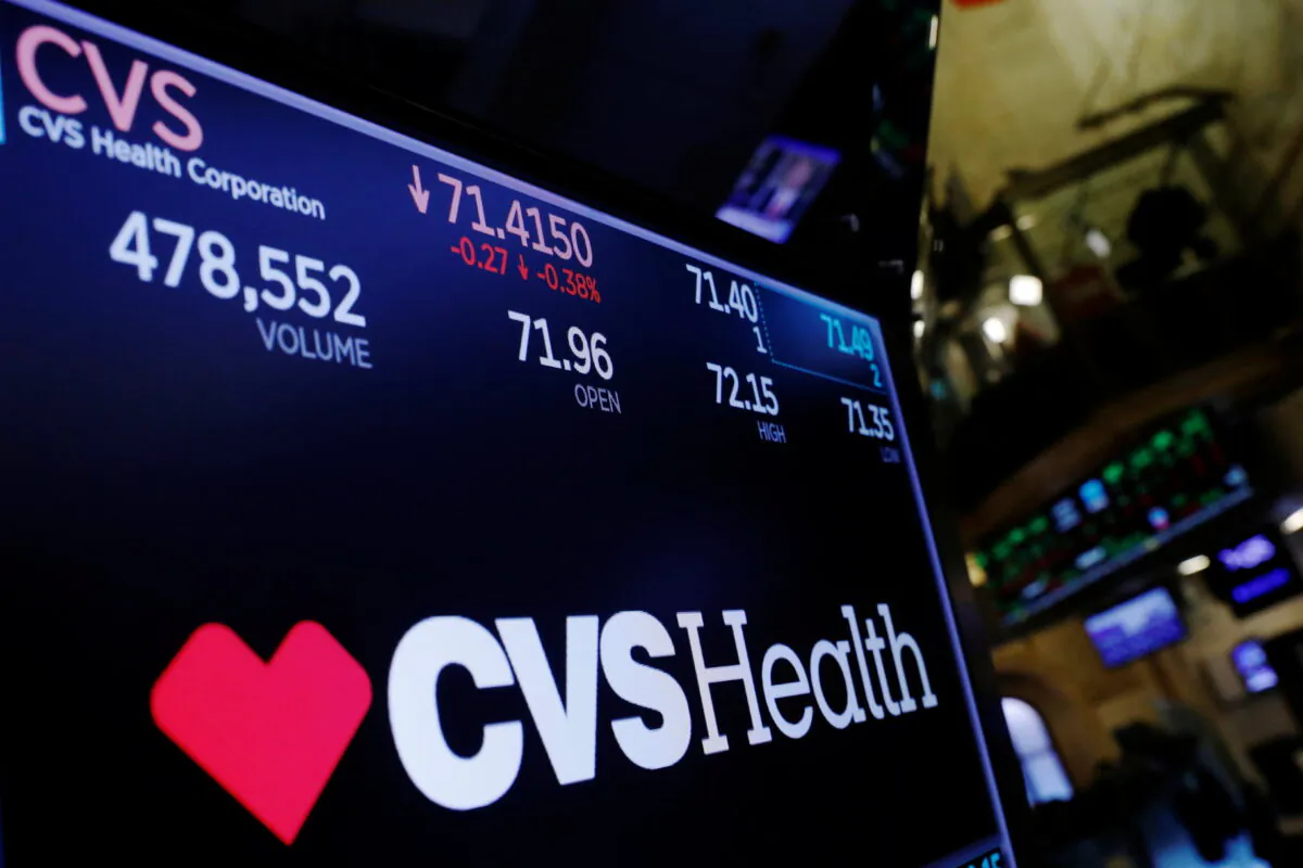 A logo of CVS Health is displayed on a monitor above the floor of the New York Stock Exchange shortly after the opening bell in New York, on Dec. 5, 2017. (Lucas Jackson/Reuters)