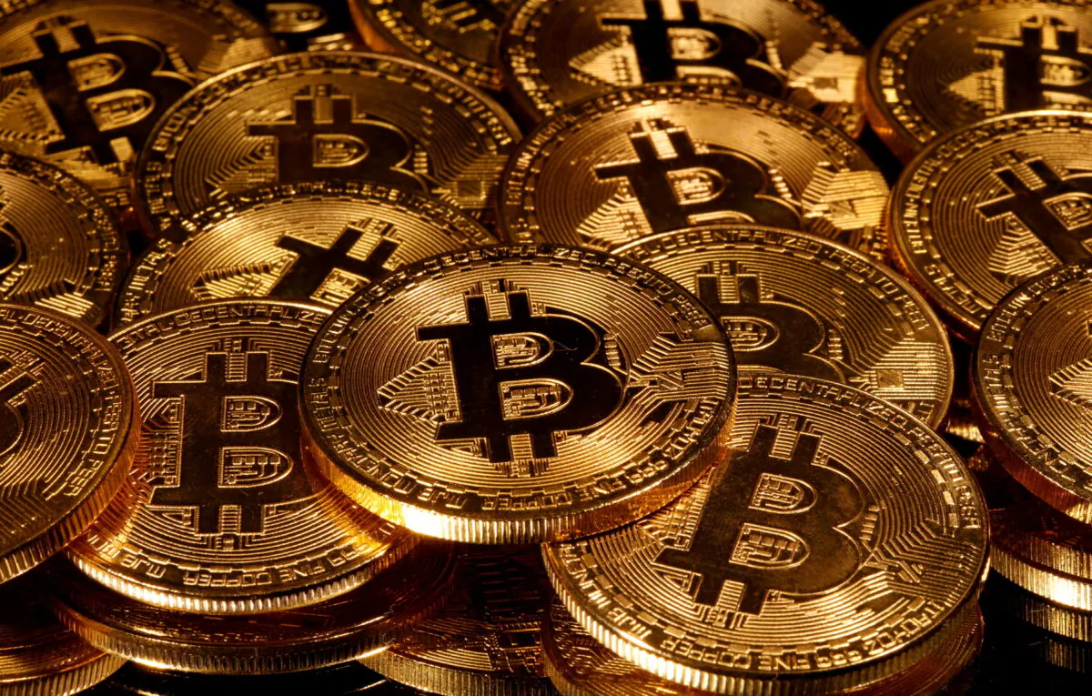 FILE - Representations of virtual currency Bitcoin are seen in this picture illustration taken taken March 13, 2020. REUTERS/Dado Ruvic/Illustration/