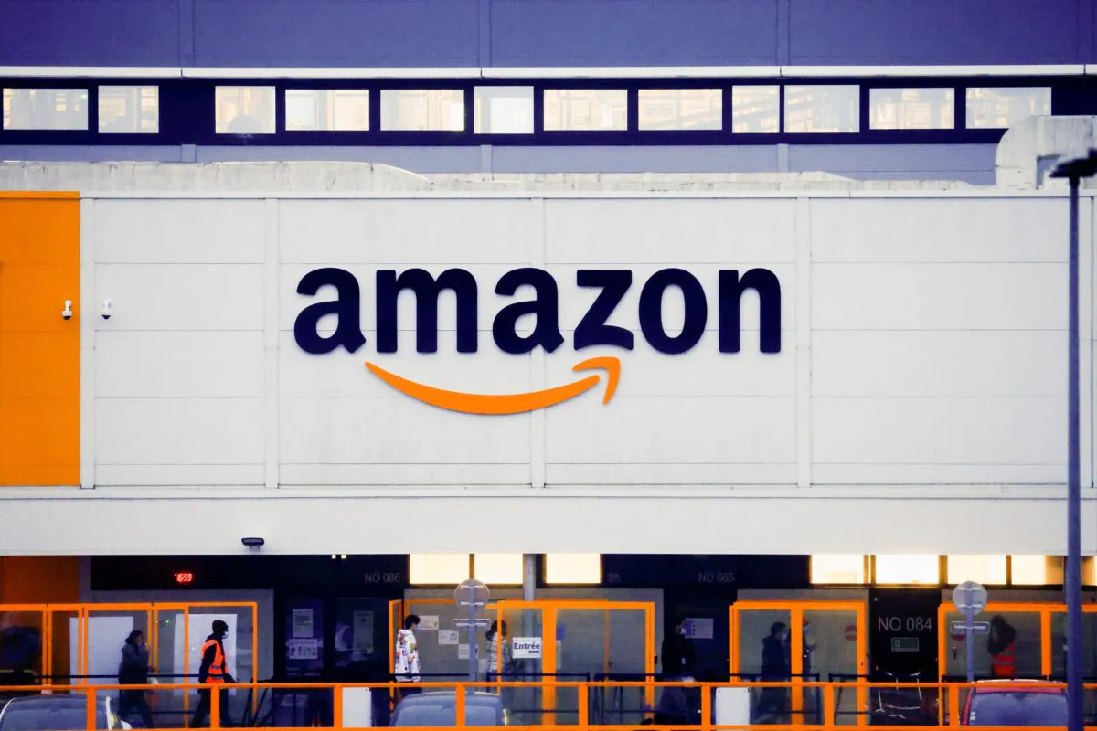 The Amazon logo is seen at the company's logistics center in Bretigny-sur-Orge, near Paris on Dec. 7, 2021. (Gonzalo Fuentes/Reuters)