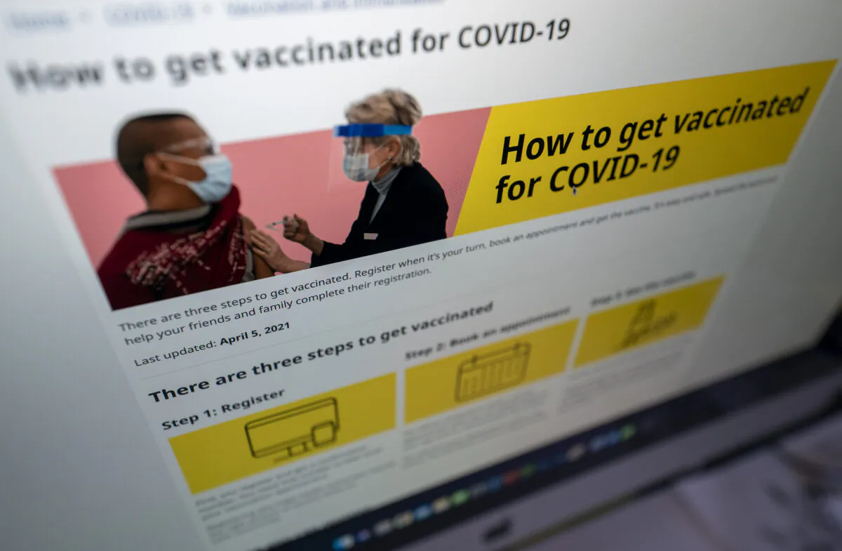 Vaccination information is shown on the government of British Columbia’s website on a computer in North Vancouver, B.C., on April 5, 2021. (The Canadian Press/Jonathan Hayward)