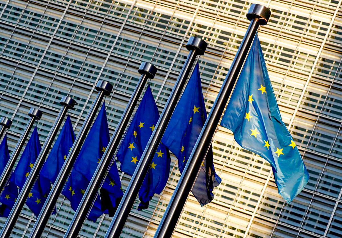 European Union flags are seen outside the European Commission headquarters in Brussels, on Nov. 14, 2018. (Francois Lenoir/Reuters)