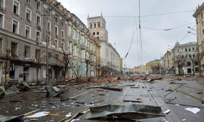 A picture shows damages after the shelling by Russian forces of Constitution Square in Kharkiv, Ukraine's second-biggest city, on March 2, 2022. (SERGEY BOBOK/AFP via Getty Images)