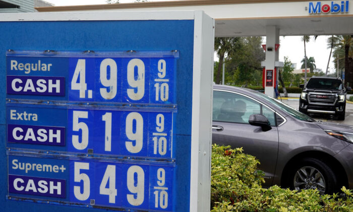 A sign reflects the price per gallon of fuel in a March 2022 file photo. (Joe Raedle/Getty Images)