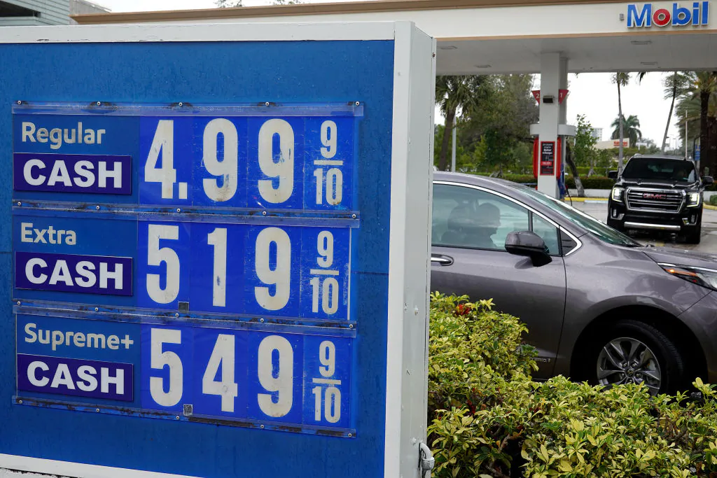 A sign reflects the price per gallon of fuel in a March 2022 file photo. (Joe Raedle/Getty Images)
