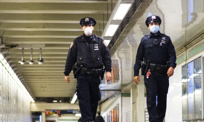 NYPD officers patrol inside Times Square station in New York on May 06, 2020. (Eduardo Munoz Alvarez/Getty Images)