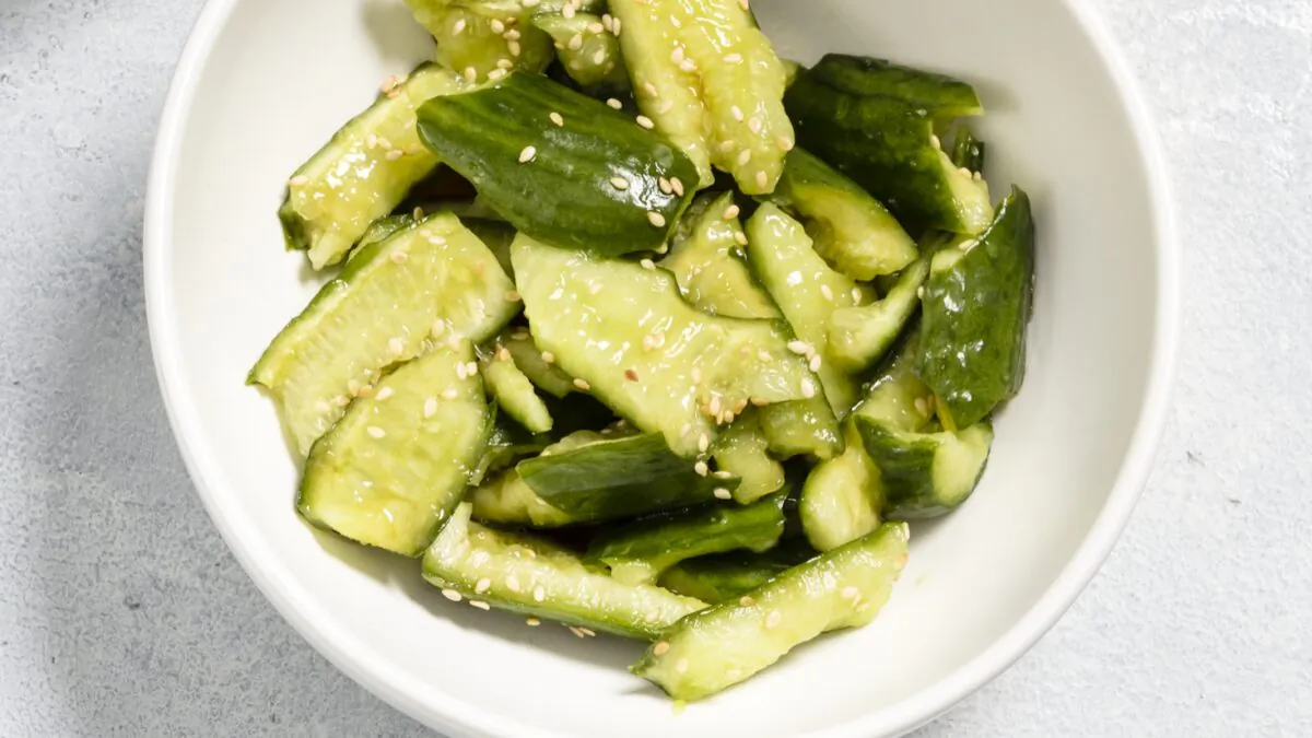 Smashing the cucumbers allows the dressing to add more flavor throughout the dish. (Ashley Moore)