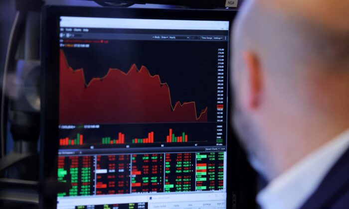 A screen is seen on the trading floor at the New York Stock Exchange (NYSE) in Manhattan, New York City, on March 7, 2022. (Andrew Kelly/Reuters)