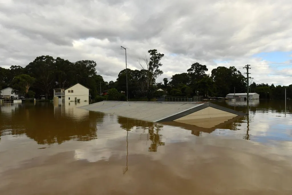 Houses inundated with floodwaters from an overflowing Hawkesbury River are pictured in the NSW suburb of Windsor, near Sydney, Australia on March 9, 2022. (Saeed Khan/Getty Images)
