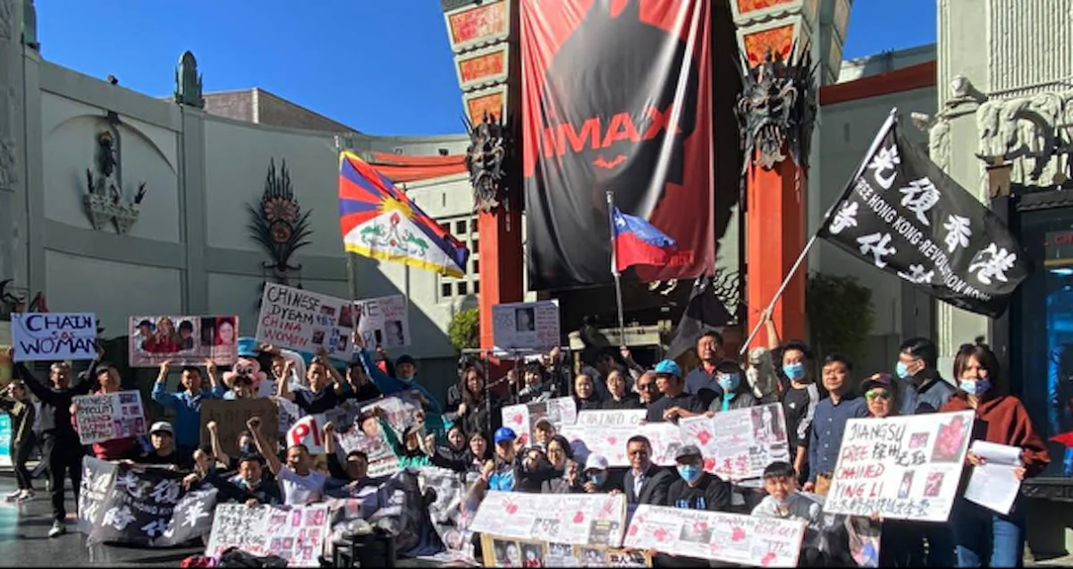 On March 8, 2022, Los Angeles Chinese nationals supported the "chained woman" outside Grauman's Chinese Theatre on the Hollywood Walk of Fame. (Provided by Jie Lijian)