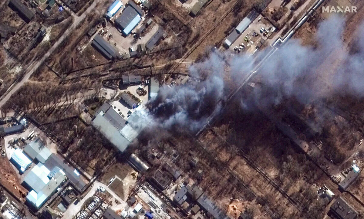 A closeup view of fires in an industrial area and nearby fields in southern Chernihiv, Ukraine, during the Russian invasion, on March 10, 2022. (Satellite image 2022 Maxar Technologies via AP)
