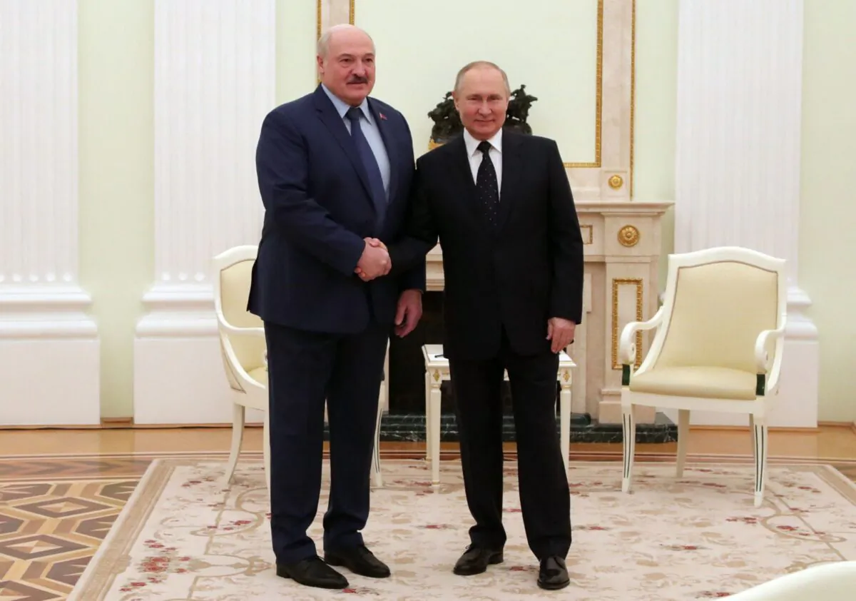 Russian President Vladimir Putin meets with his Belarus' counterpart Alexander Lukashenko at the Kremlin in Moscow, on March 11, 2022. (Mikhail Mikhail Klimentyev/Sputnik/AFP via Getty Images)