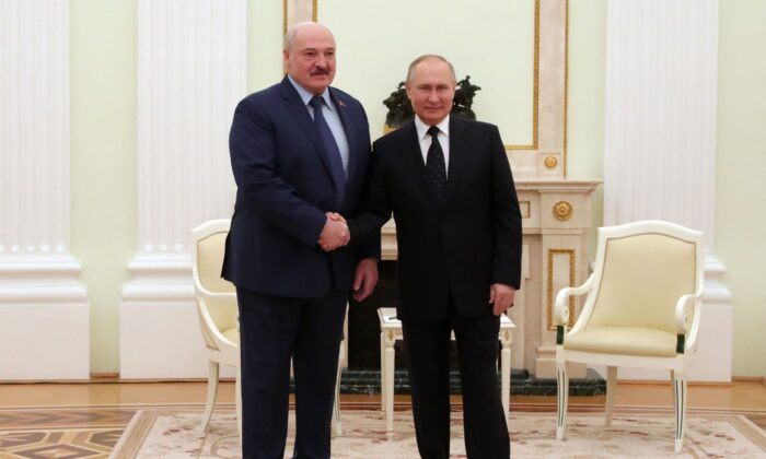 Russian President Vladimir Putin meets with his Belarus' counterpart Alexander Lukashenko at the Kremlin in Moscow, on March 11, 2022. (Mikhail Mikhail Klimentyev/Sputnik/AFP via Getty Images)