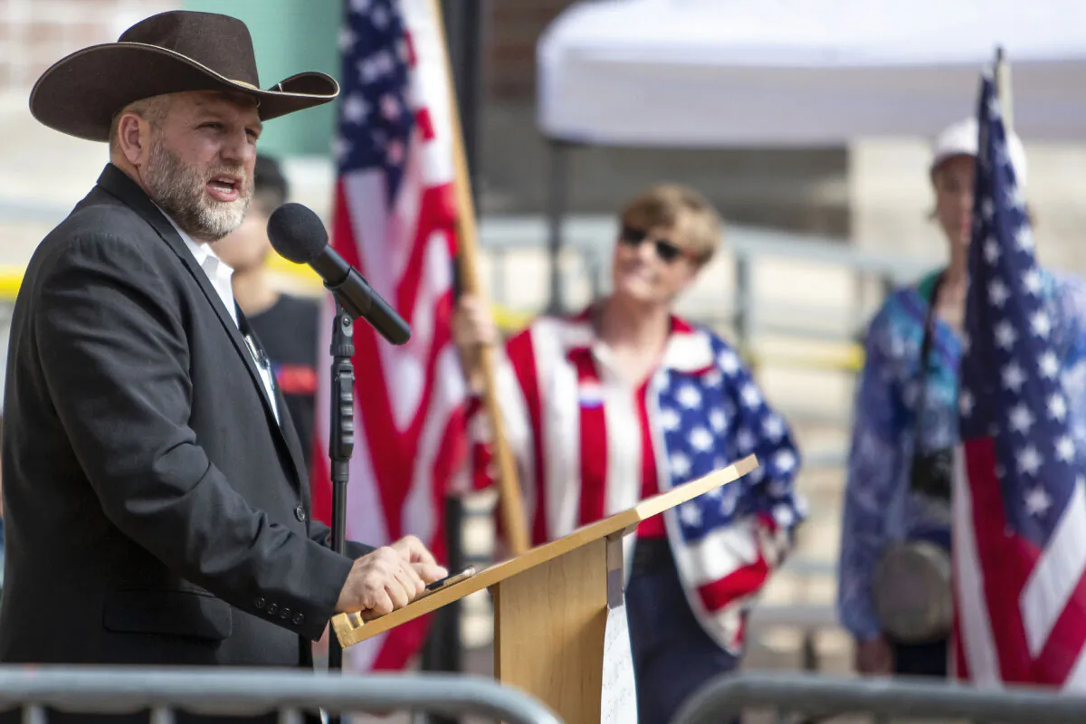Ammon Bundy speaks to a crowd of about 50 followers in front of the Ada County Courthouse in downtown Boise, Idaho, on April 3, 2021. (Darin Oswald/Idaho Statesman via AP)