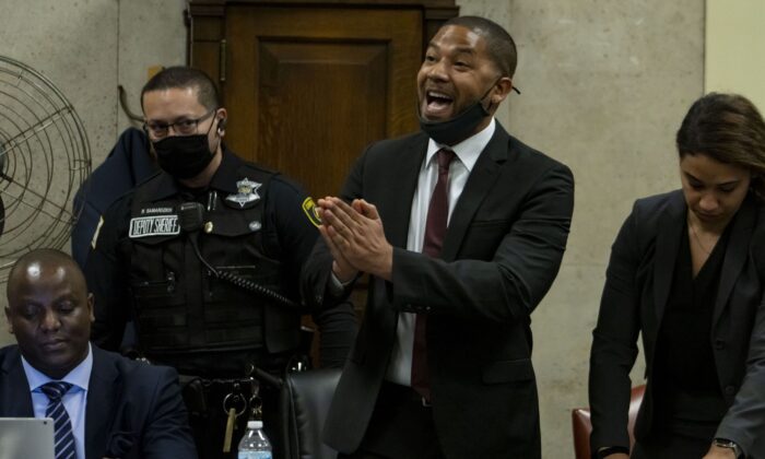 Actor Jussie Smollett speaks to Judge James Linn after his sentence is read at the Leighton Criminal Court Building in Chicago on March 10, 2022. (Brian Cassella/Chicago Tribune via AP, Pool)