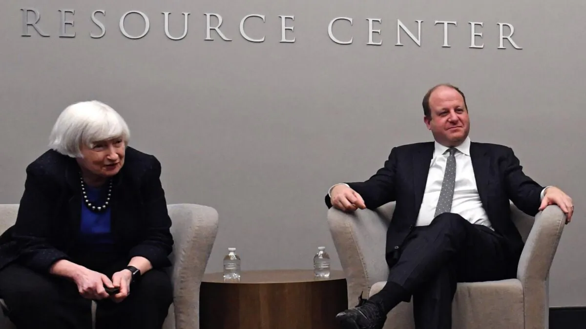 U.S. Secretary of the Treasury Janet Yellen (L) and Colorado Gov. Jared Polis meet with women entrepreneurs for a panel discussion while visiting Mi Casa Resource Center in Denver, Colo., on March 11, 2022. (Jason Connolly/POOL/AFP via Getty Images)