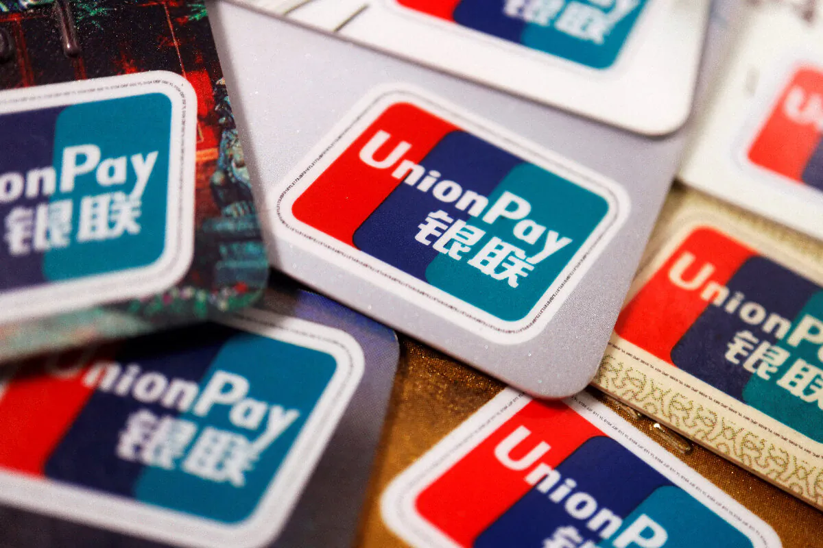 UnionPay cards displayed on March 7, 2022. (Florence Lo/Reuters)