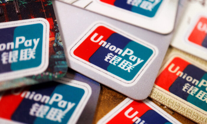 UnionPay cards displayed on March 7, 2022. (Florence Lo/Reuters)