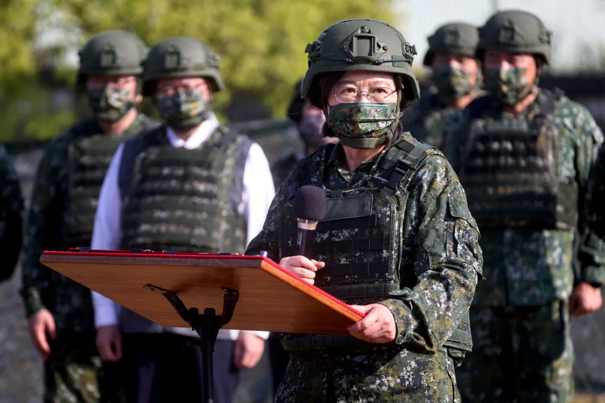 Taiwan President Tsai Ing-wen visits army reservist troop during a training in Nanshipu, Taiwan, on March 12, 2022. (Ann Wang/Reuters)