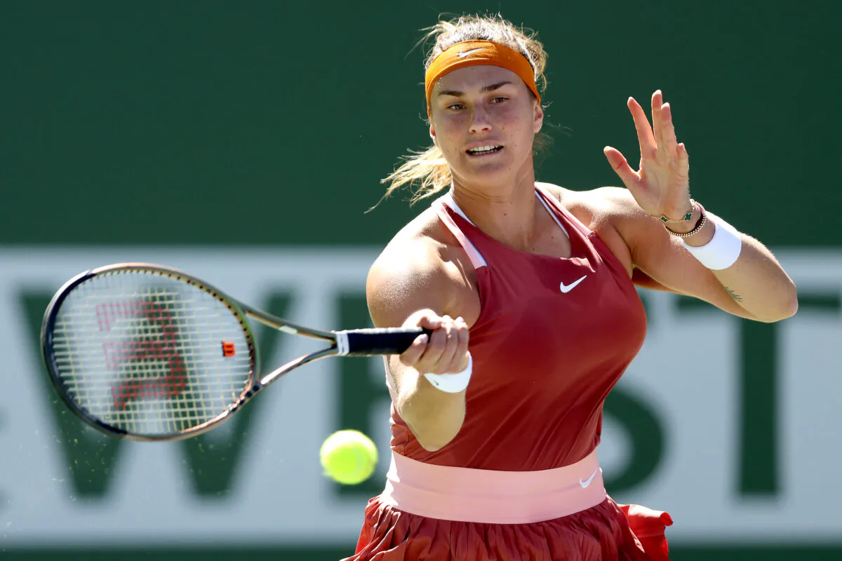 Aryna Sabalenka of Belarus returns a shot to Jasmine Paolini of Italy during the BNP Paribas Open at the Indian Wells Tennis Garden in Indian Wells, Calif., on March 12, 2022. (Matthew Stockman/Getty Images)
