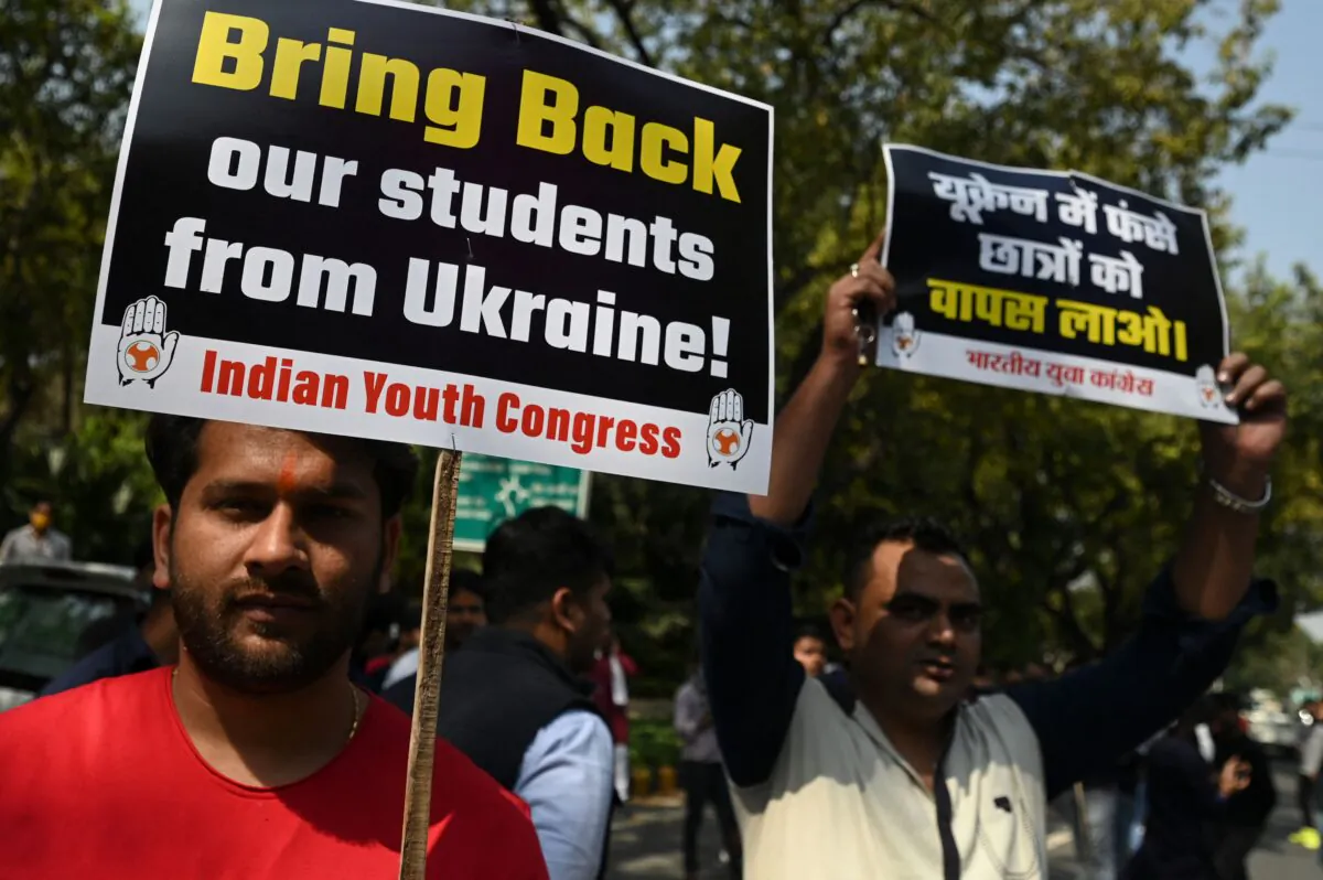 Activists of the Indian youth congress hold placards during a protest on the issue of stranded Indian students in Ukraine near the residence of Indian external affairs minister in New Delhi on March 1, 2022. (Money Sharma/AFP via Getty Images)