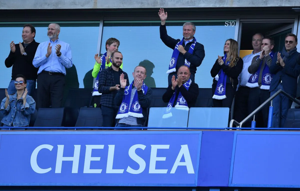 Chelsea's Russian owner Roman Abramovich waves, as players celebrate their league title win at the end of the Premier League football match between Chelsea and Sunderland at Stamford Bridge, in London, on May 21, 2017. (Ben Stansall/Getty Images)