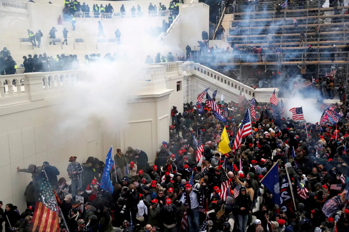 Police release tear gas into a crowd of demonstrators during clashes outside the Capitol in Washington on Jan. 6, 2021. (Shannon Stapleton/Reuters)
