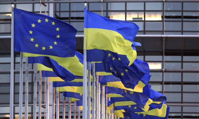 E.U. and Ukrainian flags flying near the European Parliament in Strasbourg, eastern France on March 7, 2022. (Frederick Florin/AFP via Getty Images)