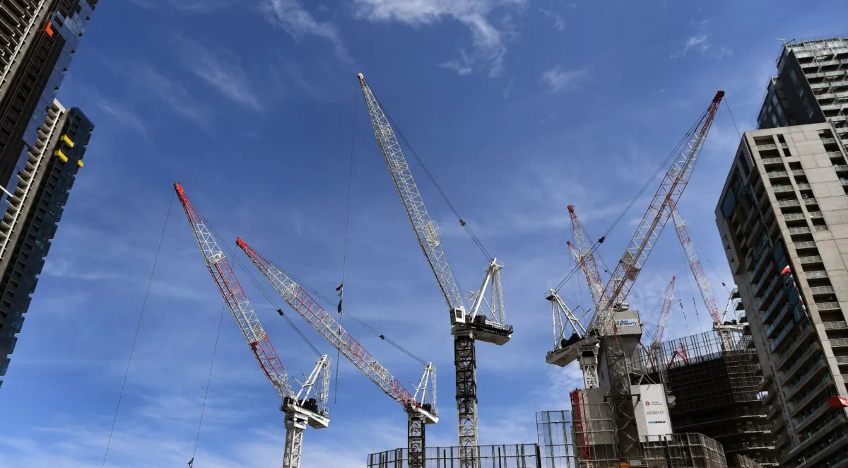 Cranes work on a building site in Melbourne's central business district in Melbourne, Australia, on Oct. 2, 2018. (William West/AFP via Getty Images)