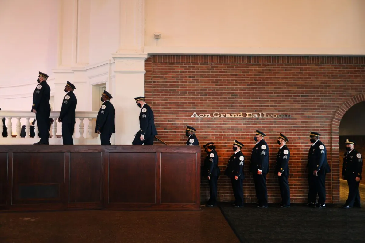 Police officers attend a Chicago Police Department promotion and graduation ceremony on October 20, 2021 in Chicago, Illinois. (Photo by Scott Olson/Getty Images)