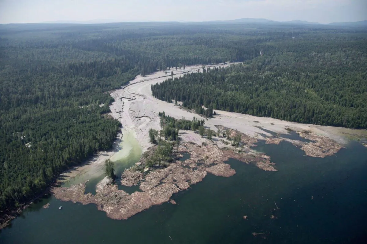 Contents from a tailings pond is pictured going down the Hazeltine Creek into Quesnel Lake near the town of Likely, B.C. on Aug. 5, 2014. (The Canadian Press/Jonathan Hayward)